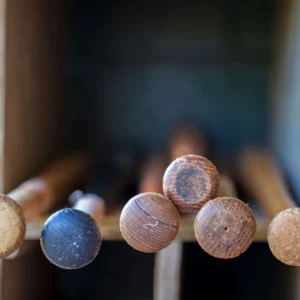 Wooden dowels in storage cubby